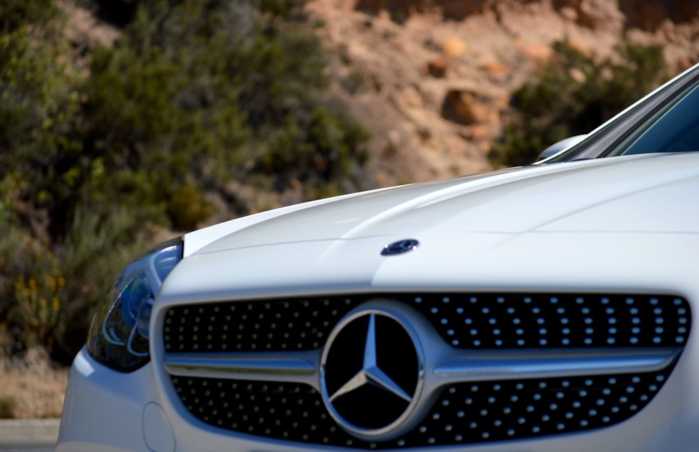 white Mercedes-Benz vehicle