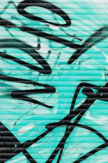 selective focus photography of gratify wall