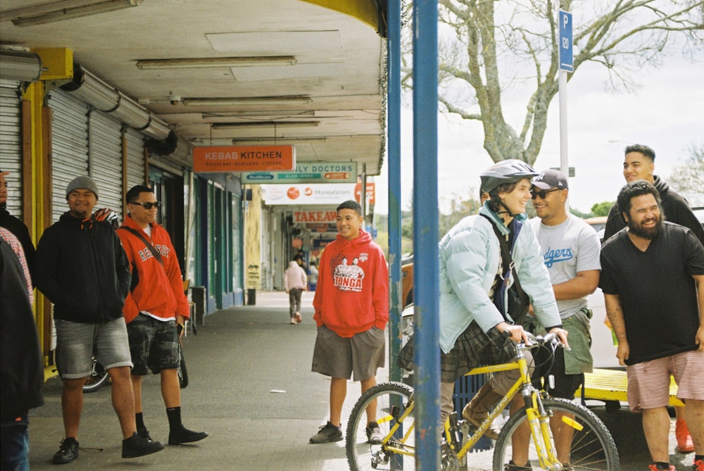 people gathered near roller shutter