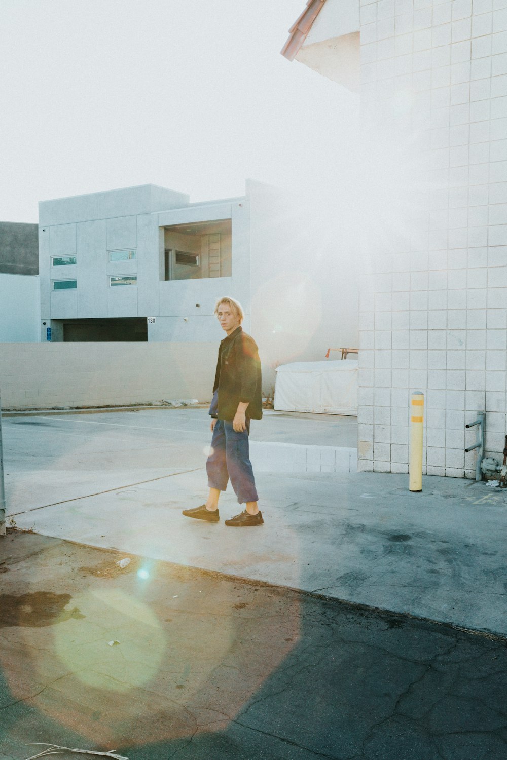 person standing near building