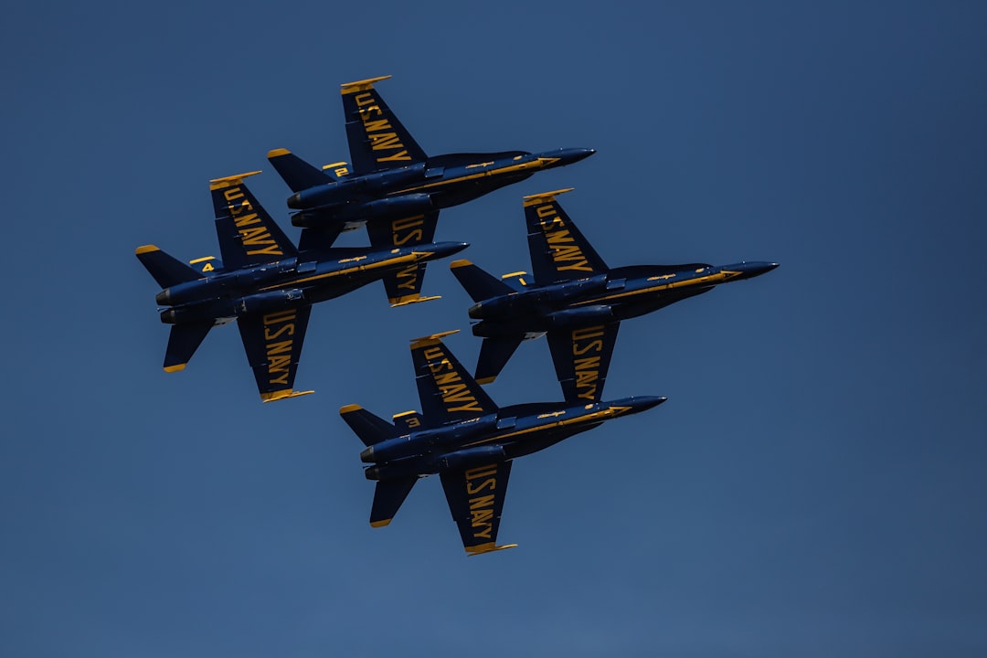 four black and yellow jet fighters, 