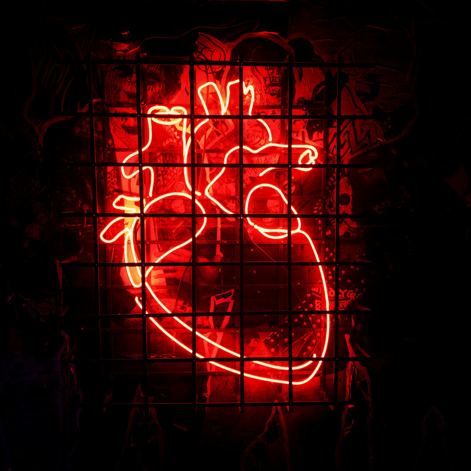 Apple iPhone X sample photo. Heart neon signage photography