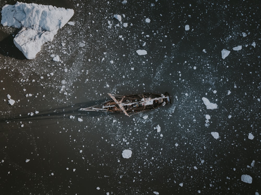 clear glass bottle full of snow