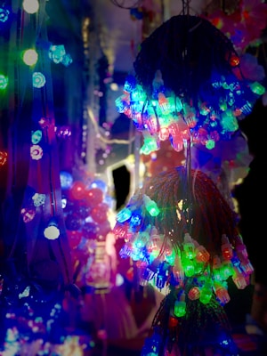 Colorful LED rope lights artfully wrapped around a festive event space, creating a cozy atmosphere.