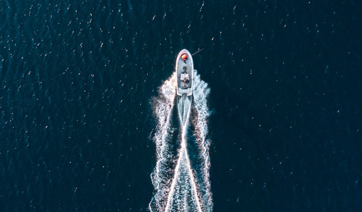 aerial photography of motorboat on sea