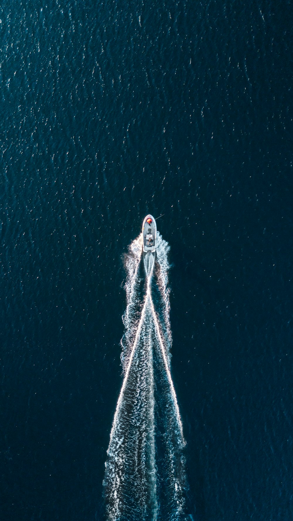 aerial photography of motorboat on sea