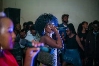 woman singing near people