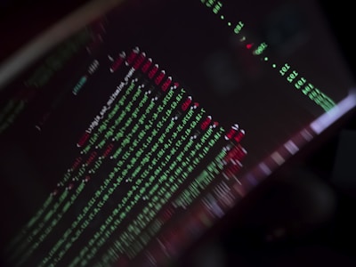 A close-up of a computer screen displaying complex AI data visualizations and code.