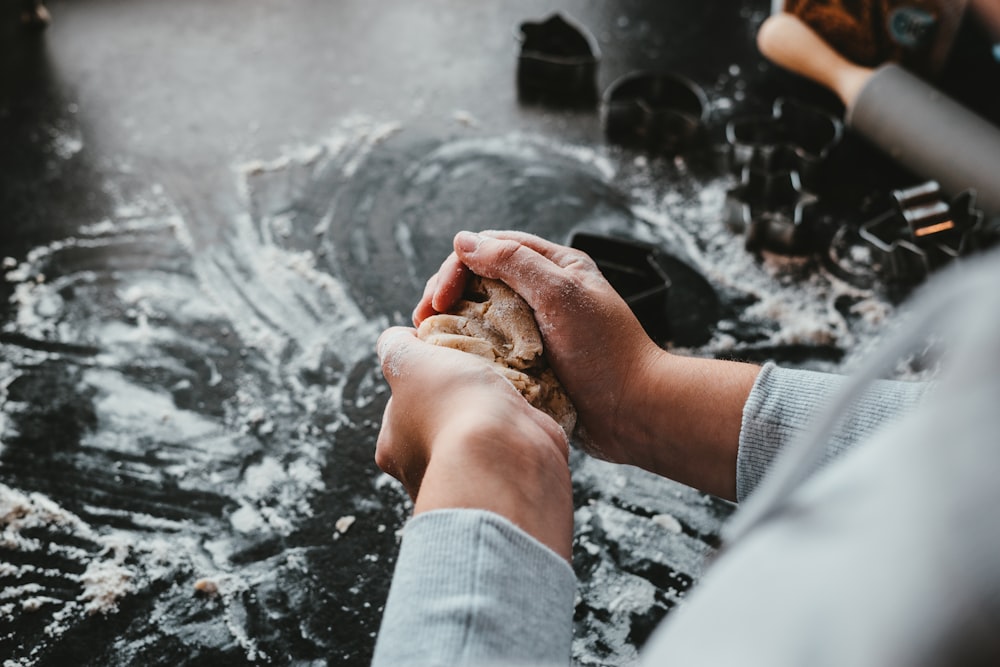 person molding clay