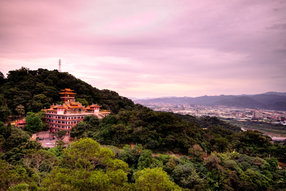 bird's eye photography of white building structure on mountain