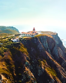 white building on cliff