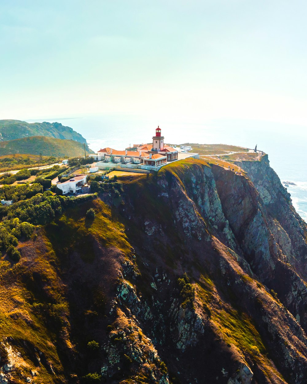 white building on cliff