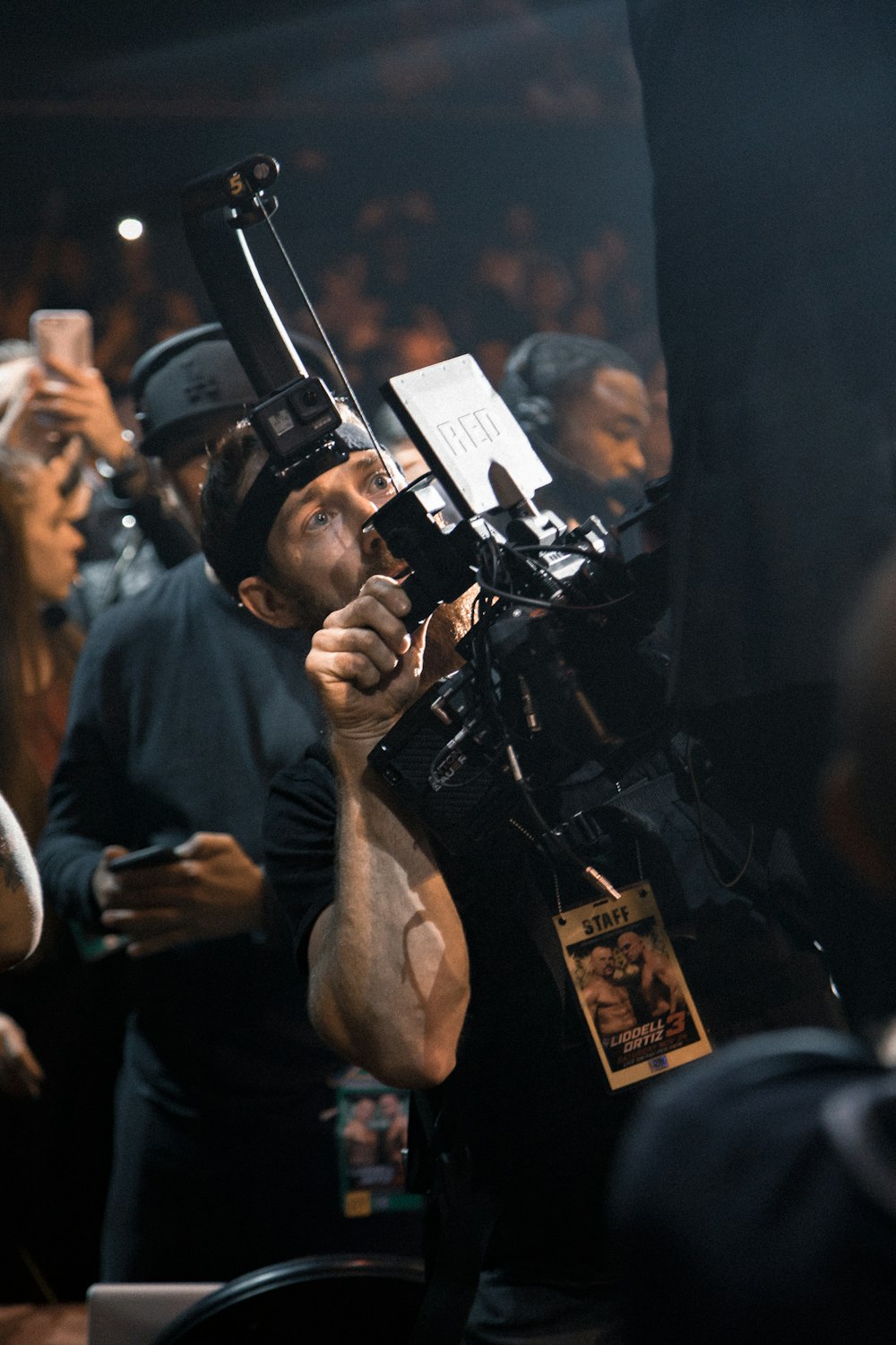 man holding professional video camera