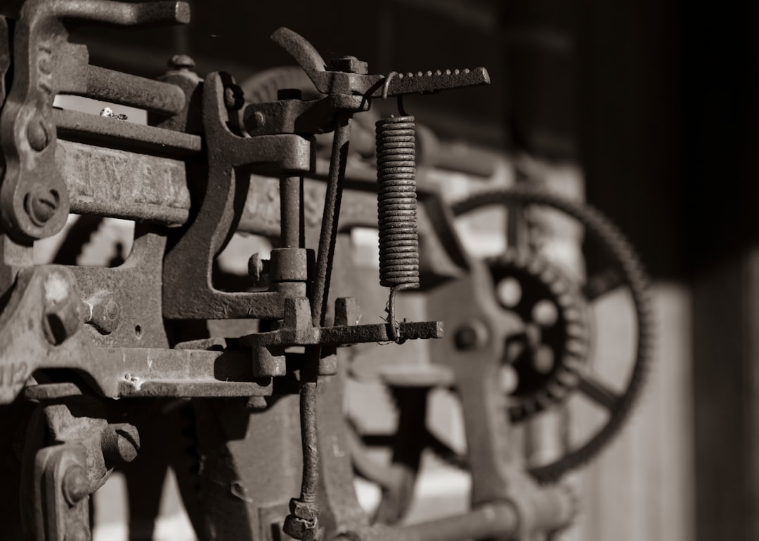 grayscale photography of industrial machine