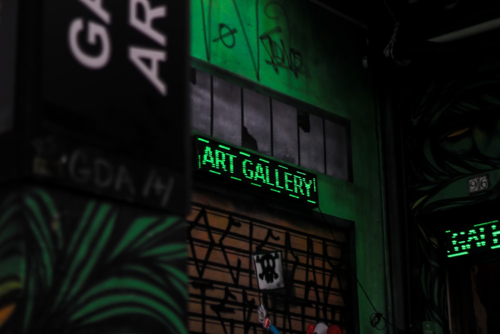 green Gallery LED signage at daytime