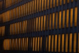 orange lighted concrete building wall