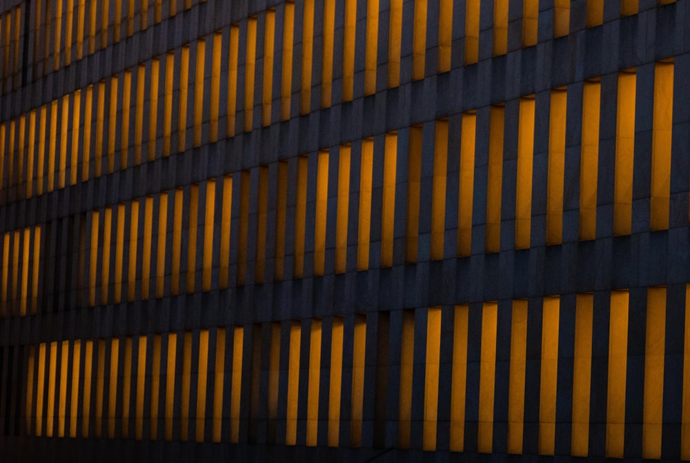 orange lighted concrete building wall