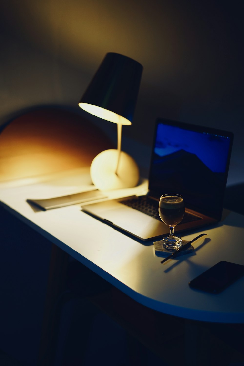 lighted desk lamp in table