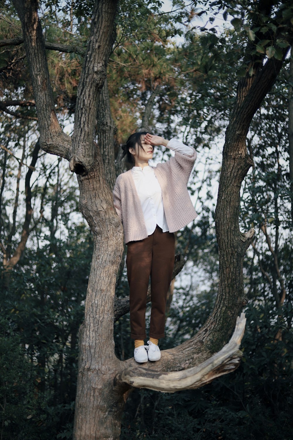 woman wearing brown cardigan