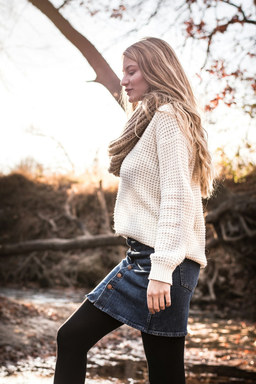 woman wearing white sweater