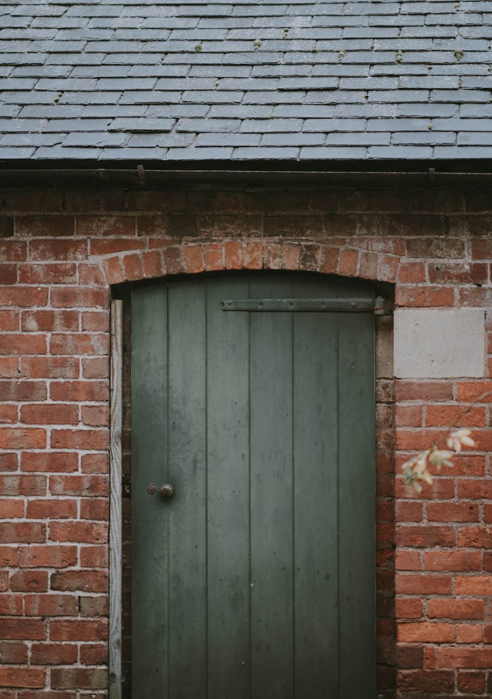 closed green wooden door