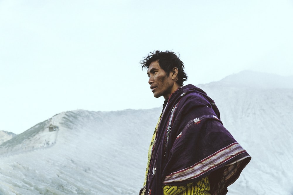 man standing on snow land