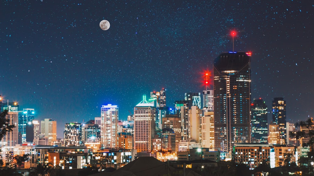 starry night above the city buildings