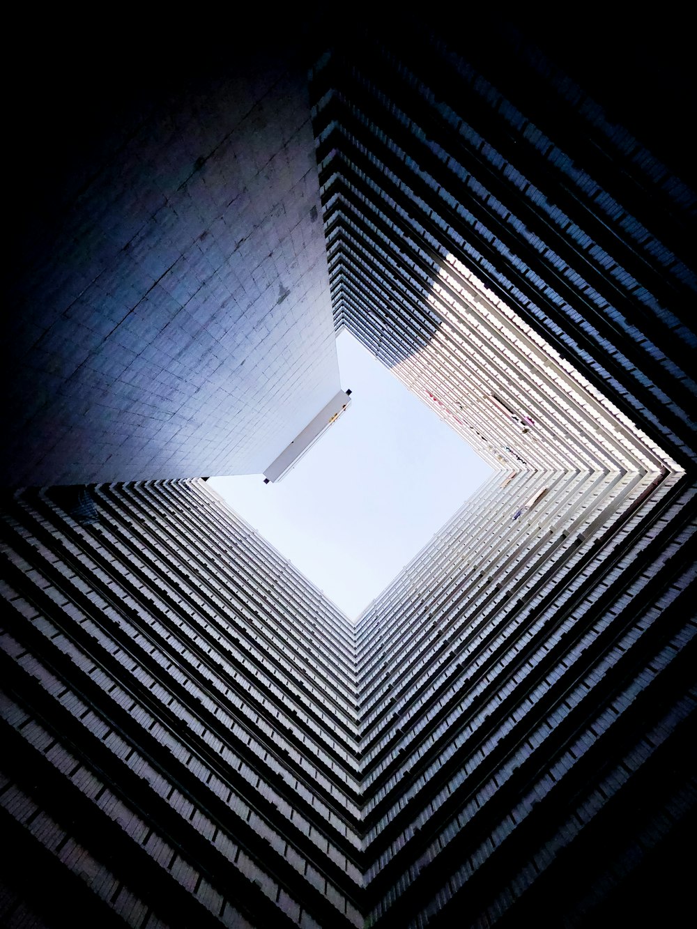 low angle photo of high rise building during daytime