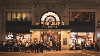 Exterior view of a welcoming hotel entrance with warm lighting