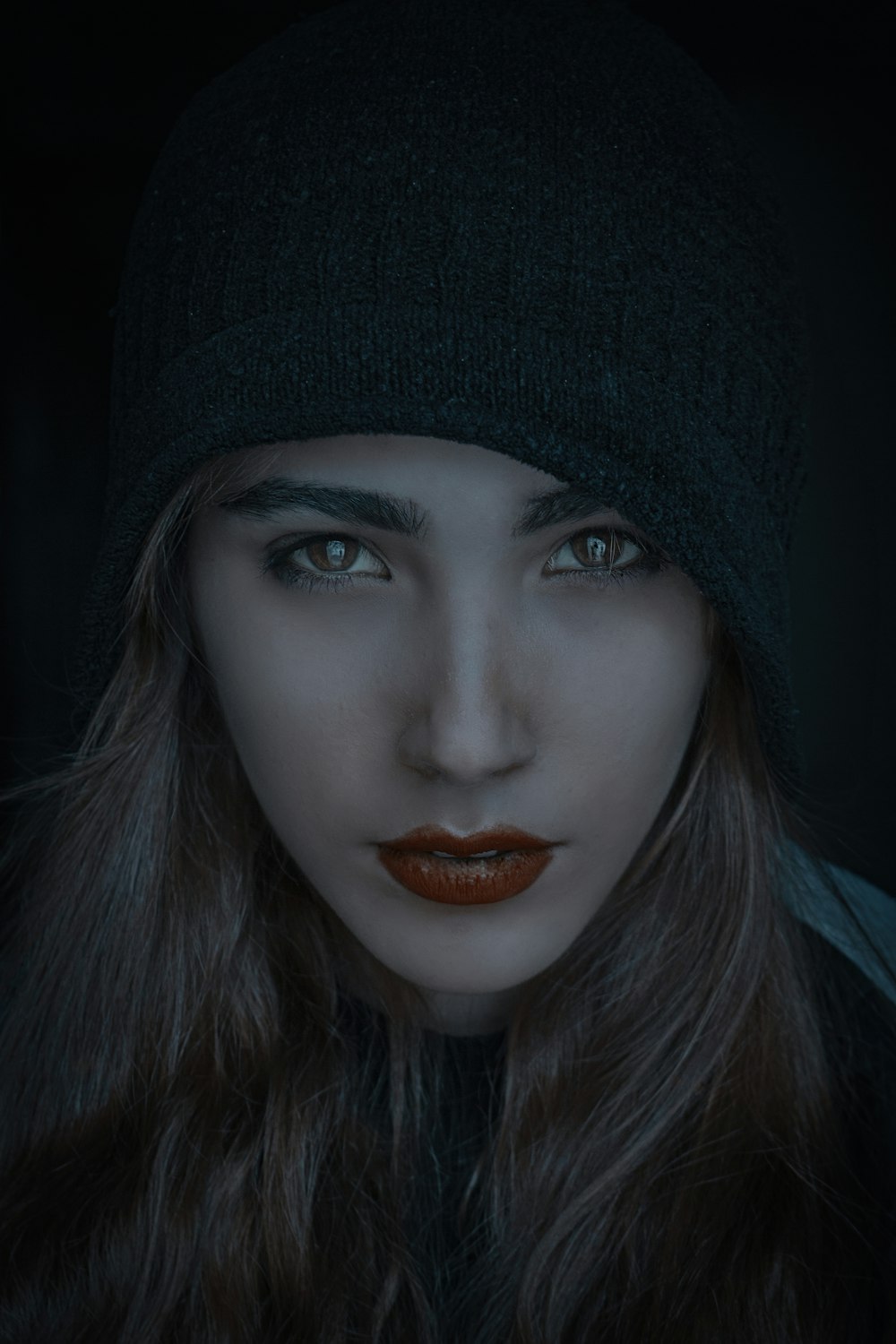 woman wearing black beanie