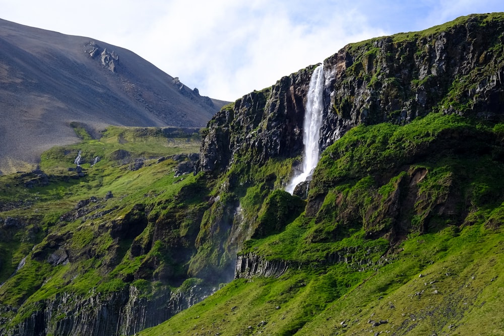 landscape photo of waterfalls during daytime
