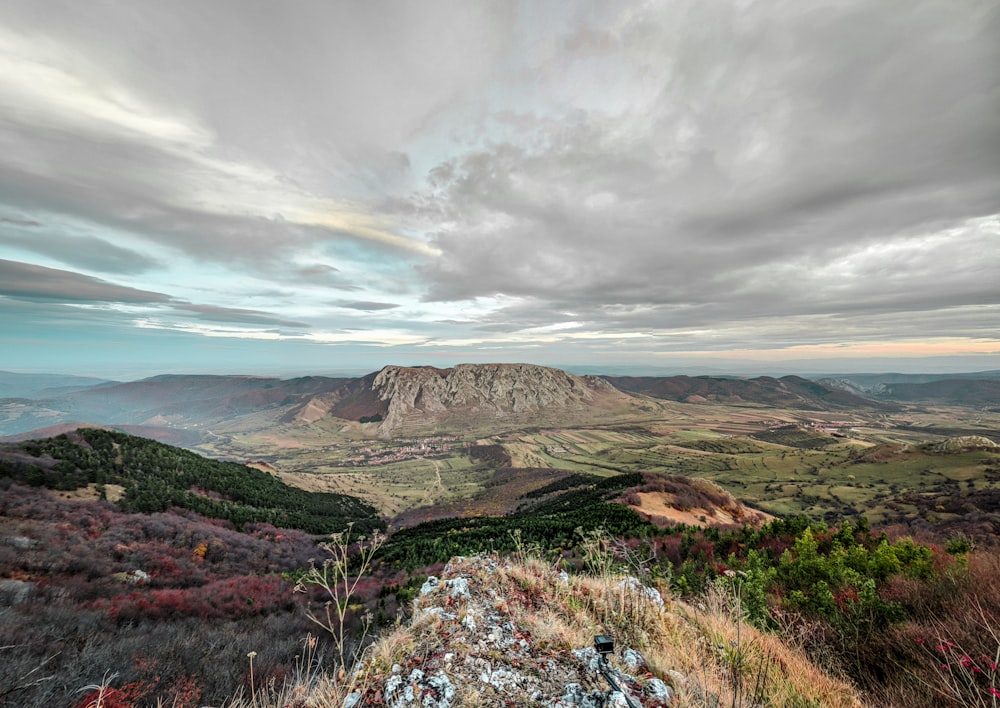 landscape photo of mountain under cloudy sky