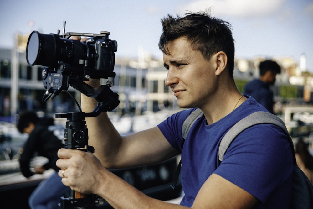 man setting up his camera