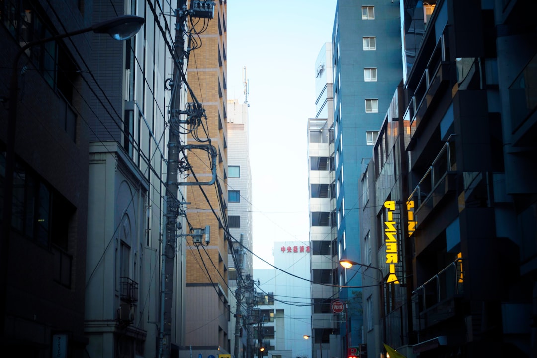 yellow LED sign in city near road