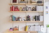 A beautifully organized bookshelf filled with decorative items.