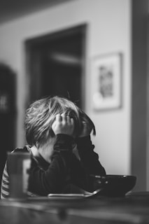 grayscale photo of boy