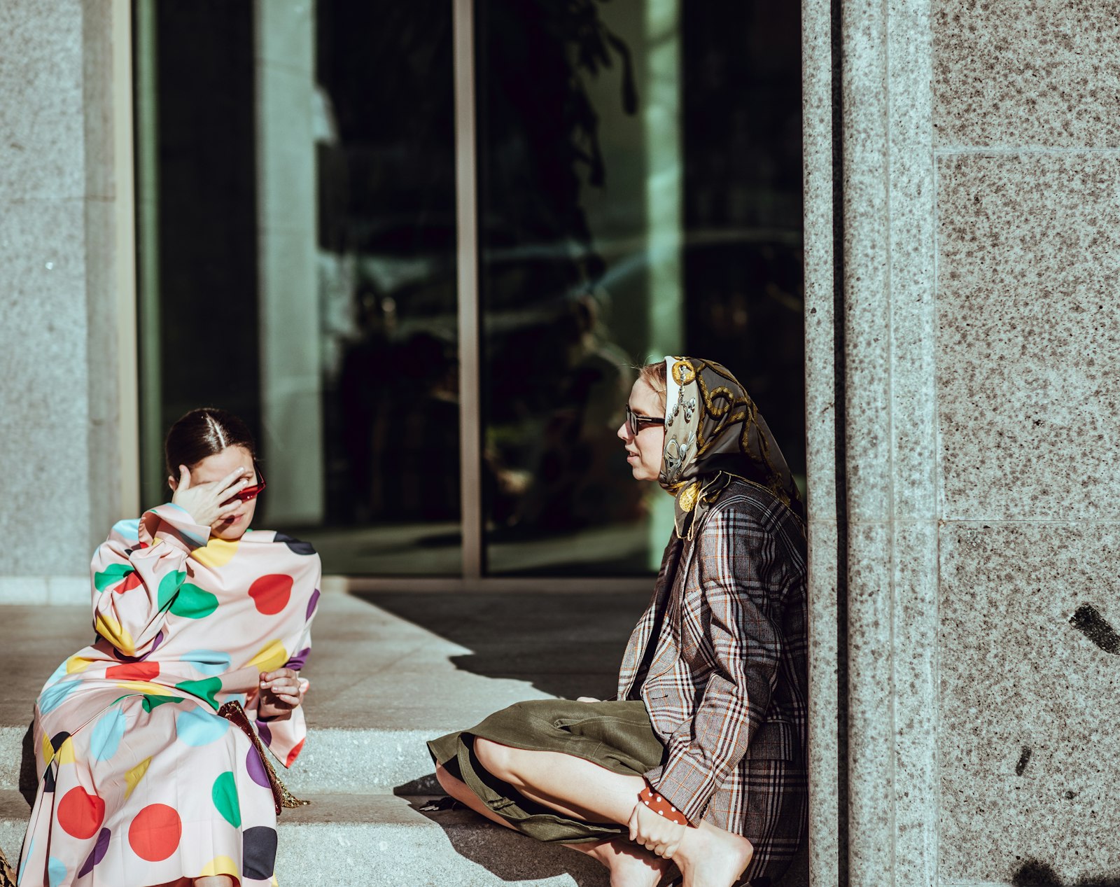 Nikon D610 + Nikon AF-S Nikkor 85mm F1.4G sample photo. Two women sitting on photography