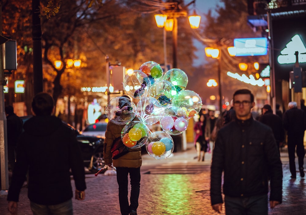 person holding balloons