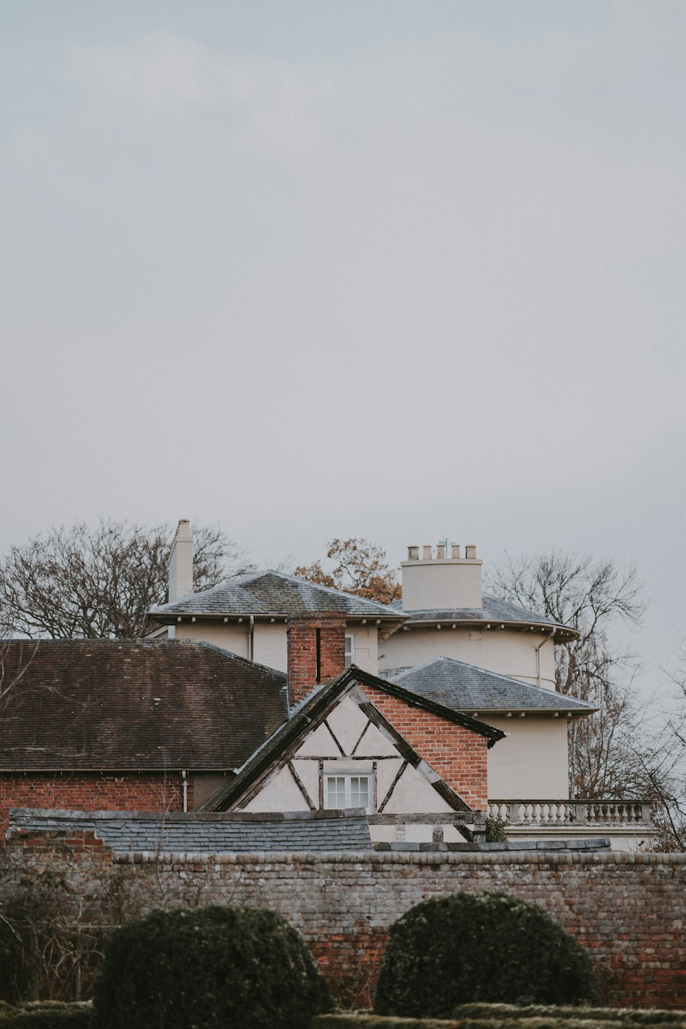 white and red concrete castle under gray sky