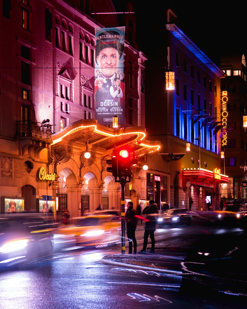 panning photography of busy street near building