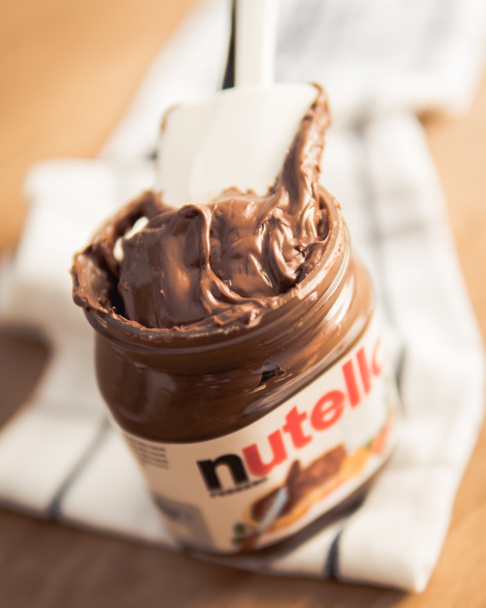 Nutella was invented during WW2, when an Italian pastry maker mixed hazelnuts into chocolate to extend his chocolate to extend his chocolate ration.