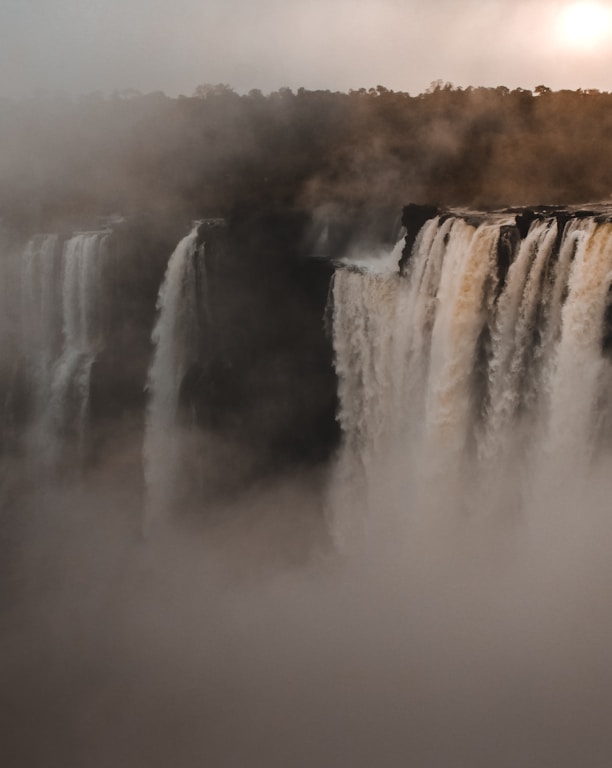 aerial photography of waterfalls at day time