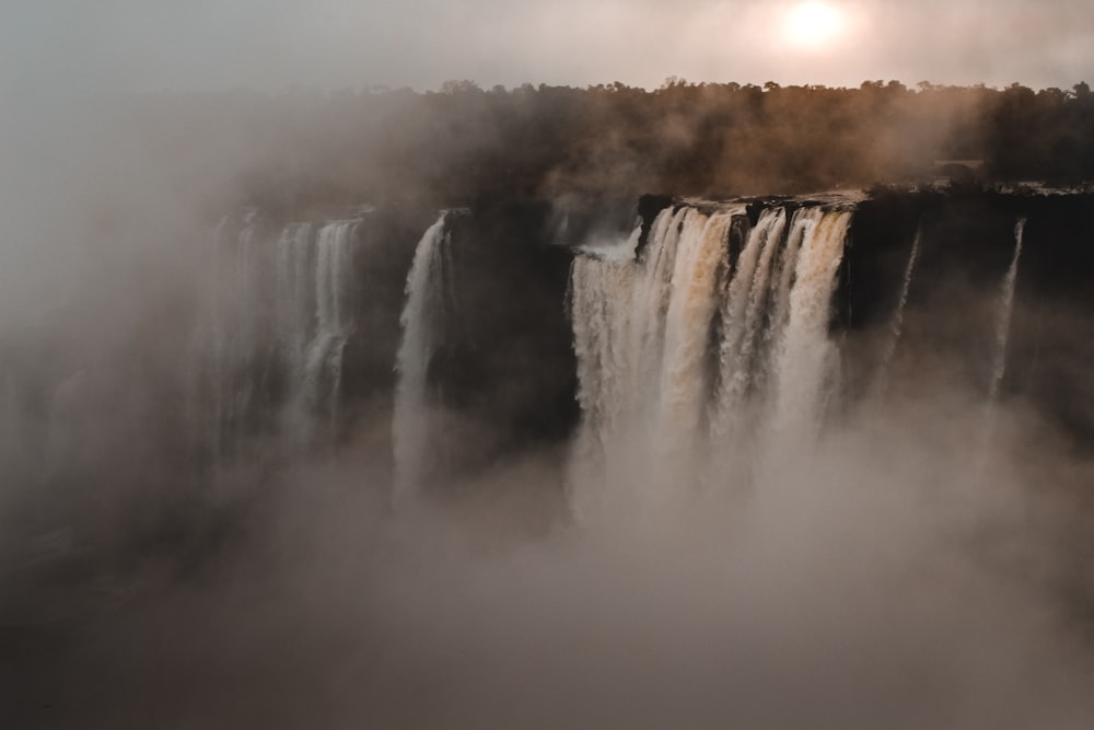 aerial photography of waterfalls at day time