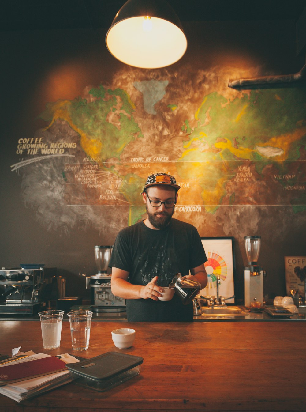 man standing in front of table