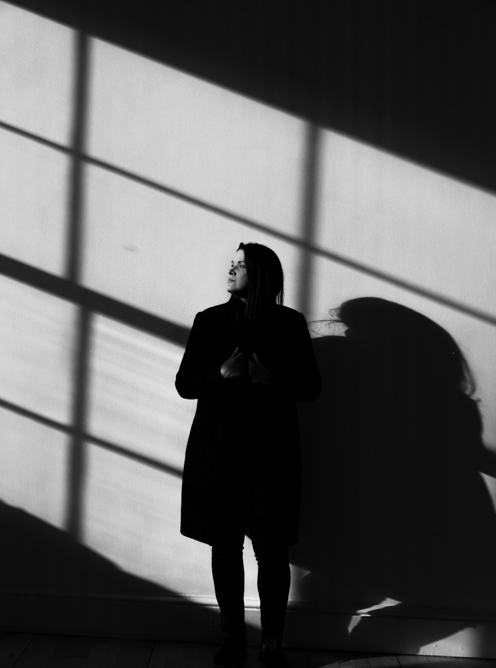 woman standing near wall