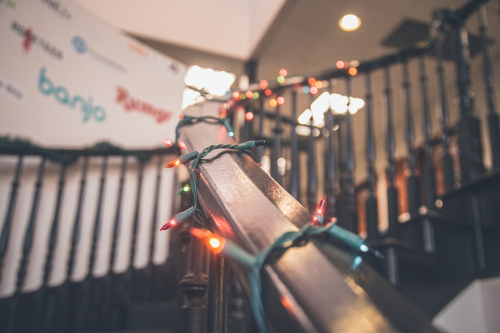 turned-on string lights on stairs