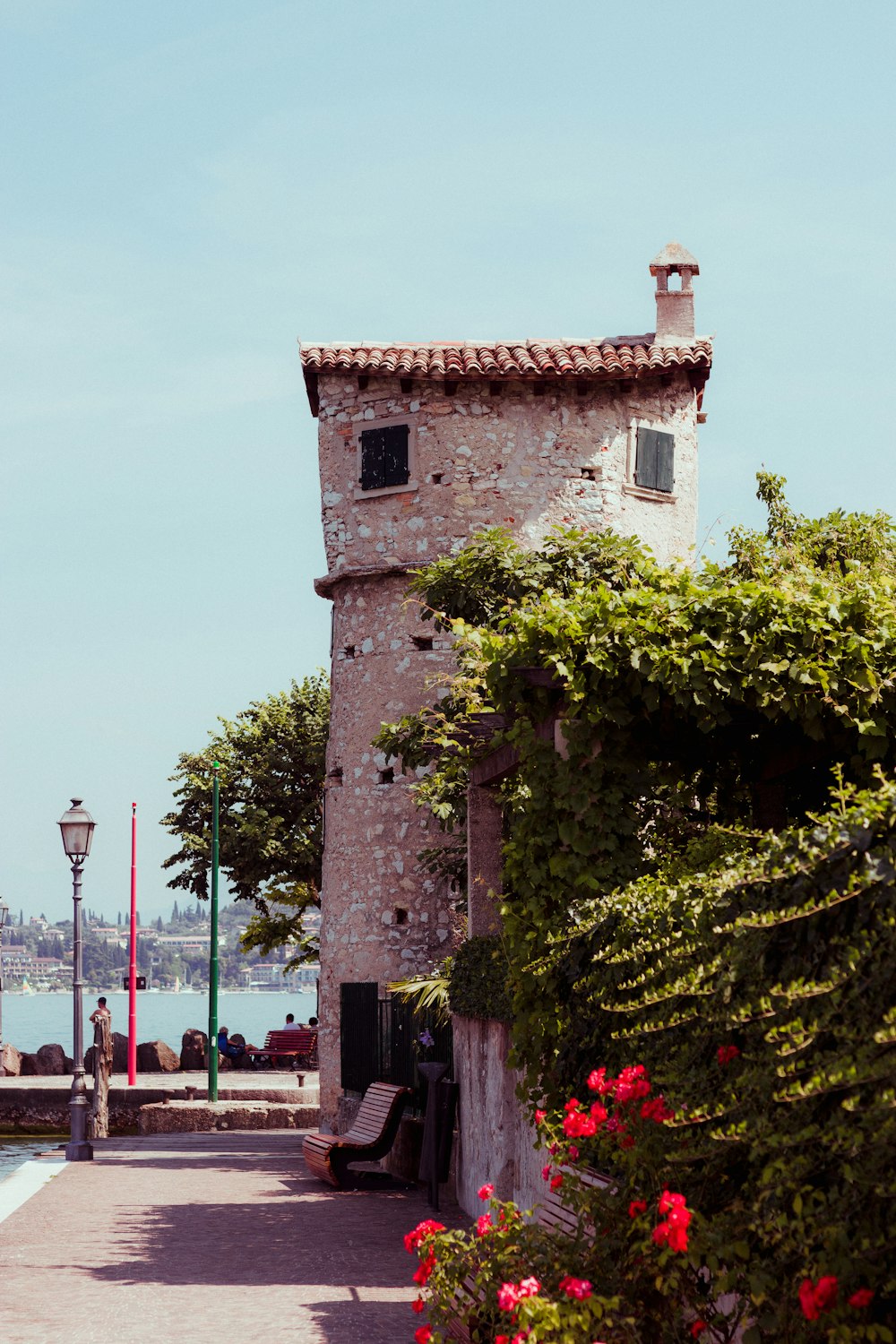 grey tower building at the harbor