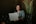 silver laptop on woman's lap