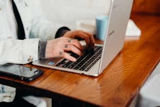 person using laptop computer