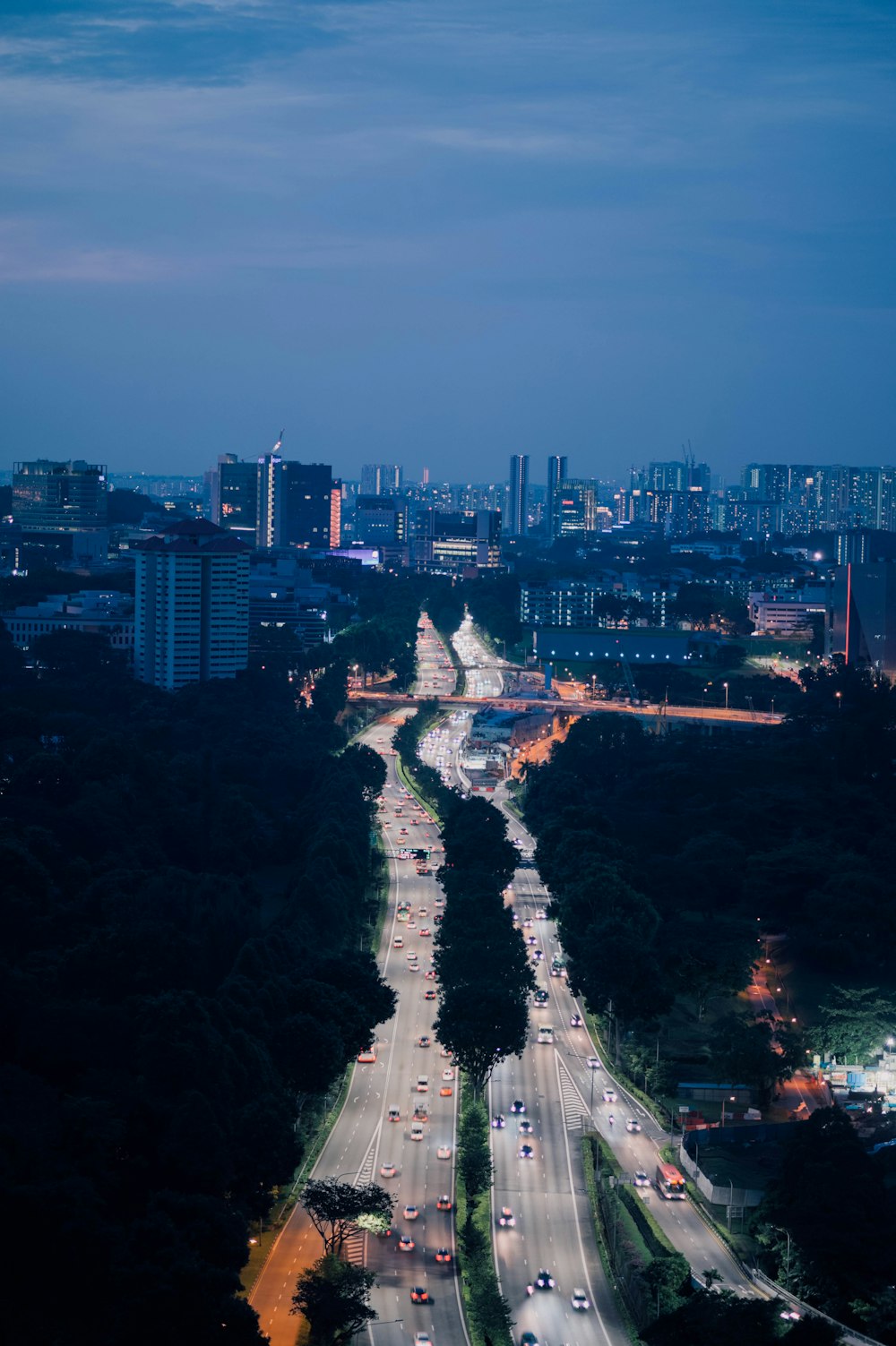 aerial view of cars on highway during dusk